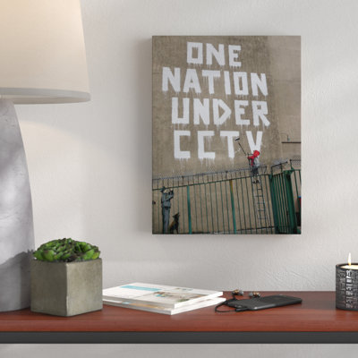 One Nation Under CCTV by Banksy - Wrapped Canvas Print
