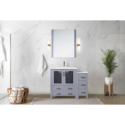 42 po W Meuble-lavabo simple gris foncé avec armoire latérale, comptoir en céramique blanche, fabrication en bois massif, tiroirs à fermeture douce, une armoire intérieure pour le rangement, comptoir à rayures et taches