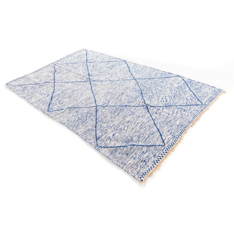 Tapis bleu Kalmanovitz