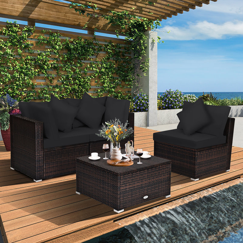Sarn, ensemble de meubles de patio en rotin avec canapé et repose-pieds, 4 pièces, noir
