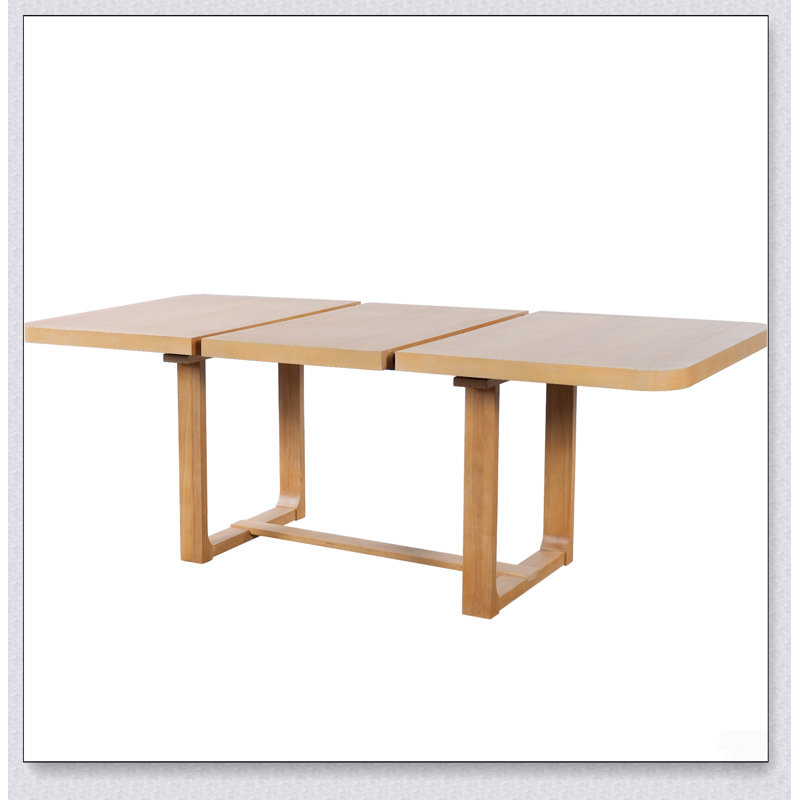Table de salle à manger extensible en bois massif avec rallonge amovible et coins arrondis pour des espaces polyvalents de convivialité à la maison