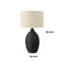 Lampe de table Lanny, base de vase en rotin noir tissé, lin beige-117054083