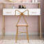 Fauteuil de coiffeuse rose clair à nœud papillon Eluid