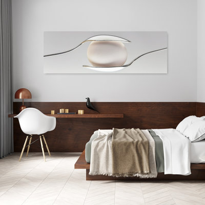 Balanced Egg And Spoons by Antonio Rodriguez Maldonado - Wrapped Canvas Panoramic Print