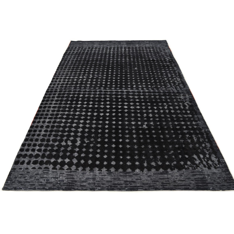 Tapis noir Iniguez