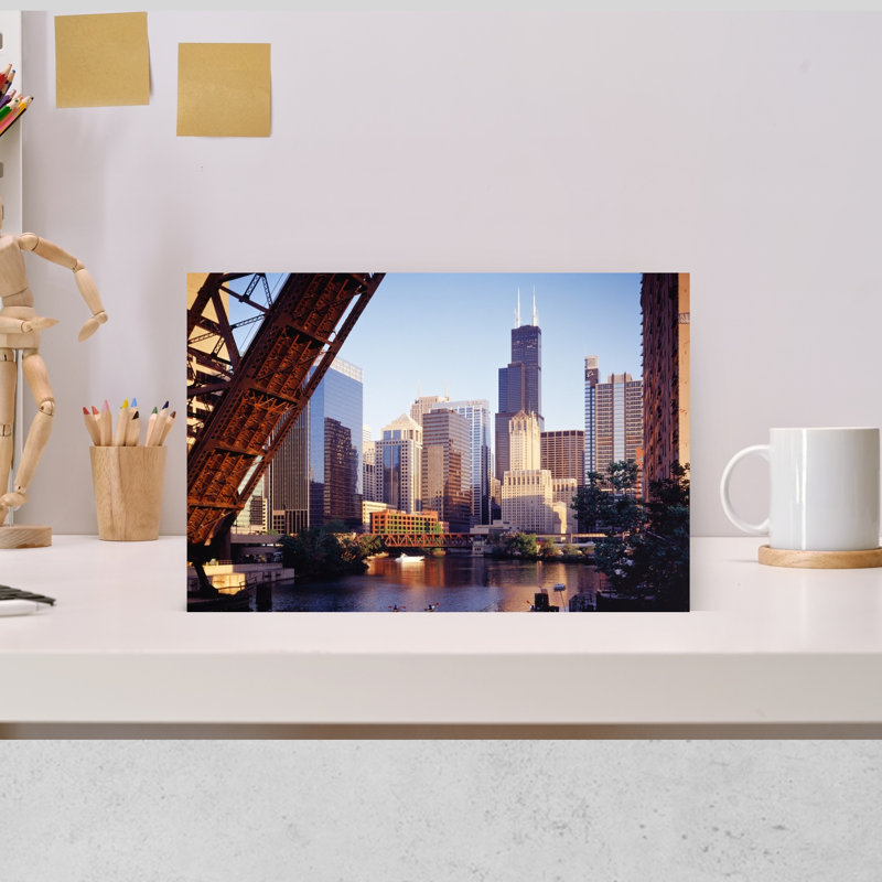 Skyscrapers In City Seen From Kinzie Street Railroad Bridge Chicago River Chicago Cook County Illinois USA by Ron Schramm - Wrapped Canvas Print