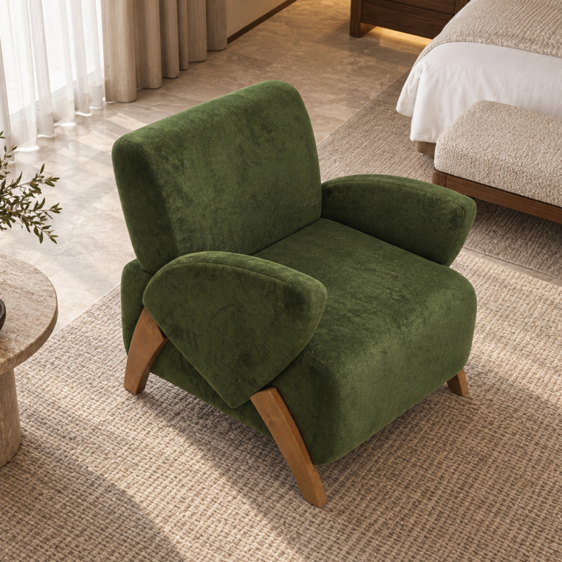 Fauteuil d'appoint moderne et compact en velours, avec accoudoirs incurvés et pieds en bouleau massif, idéal pour le salon, le bureau ou la pièce à vivre.