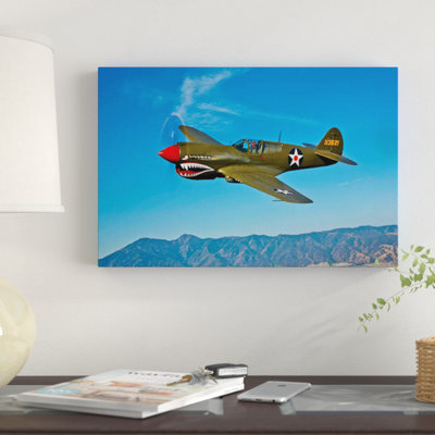 " A Curtiss P-40E Warhawk In Flight Near Chino, California II " by Scott Germain