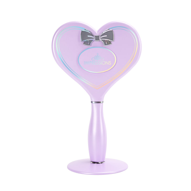 Impressions Vanity Amour LED Handheld Makeup Mirror For Desk, Lighted Travel Makeup Mirror With Detachable Magnetic Ball Standing Base, Ultra Bright Adjustable Lighting, And Heart Shaped Glossy Design