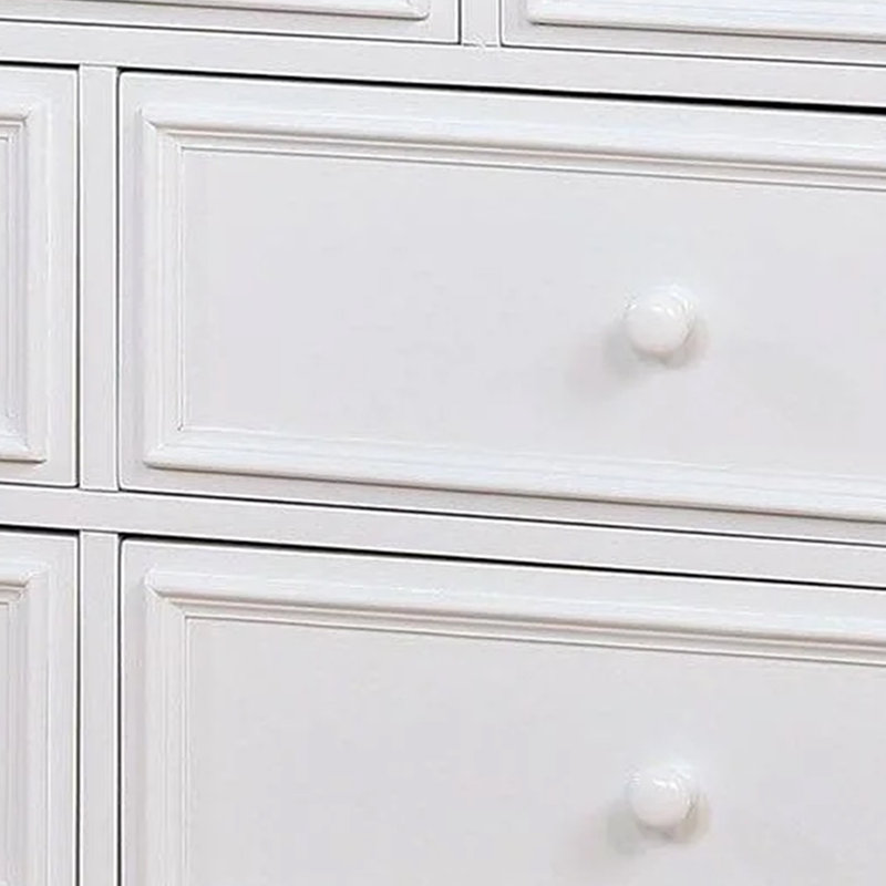 Grande commode Kny, 7 tiroirs, pieds tournés, bois massif blanc traditionnel