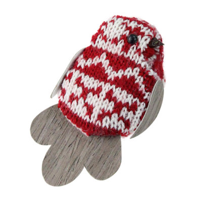 Pince à oiseaux en tricot rouge et blanche sur ornement de Noël
