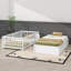 Lit de jour simple en bois avec garde-corps en forme de clôture pour la sécurité et deux tiroirs intégrés pratiques pour le rangement-229489504