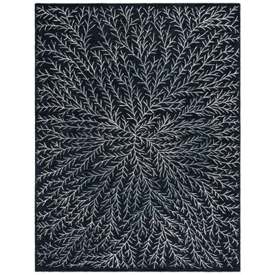 Tapis floral noir / ivoire en laine / coton / viscose touffeté à la main Soho