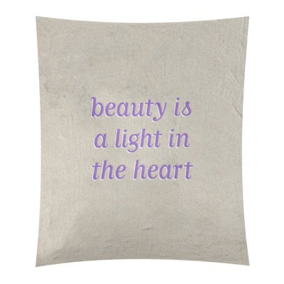 Tapisserie en polyester en citation de beauté