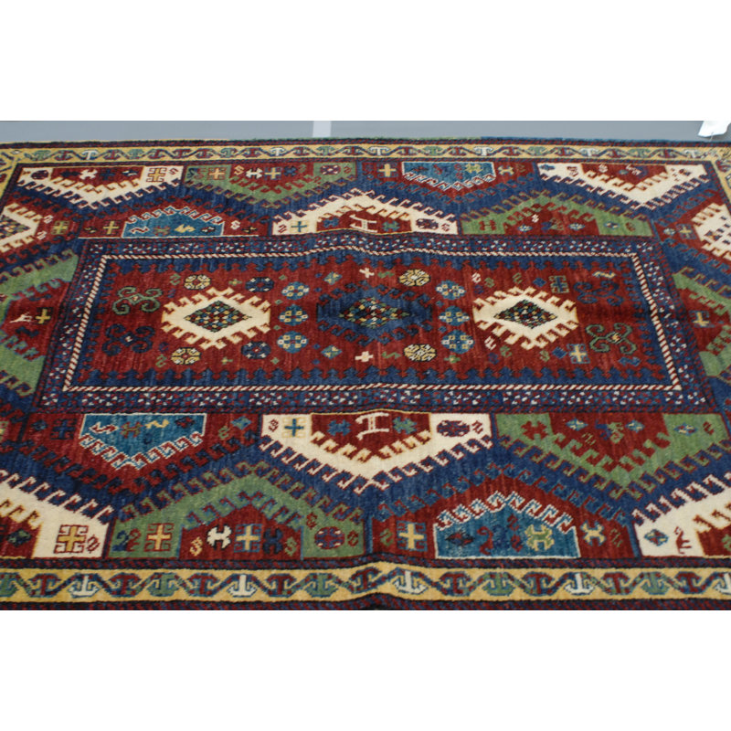 Bordjalu Wool Southwestern Area Rug in Blue/Green, Rectangle 5' x 7'