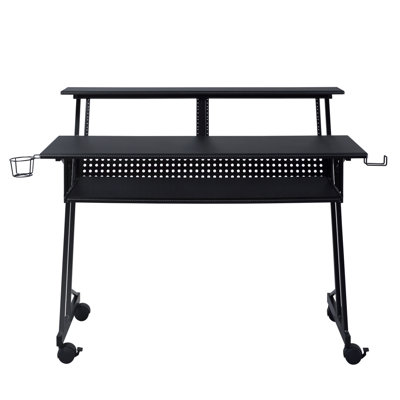 Bureau de studio noir avec plateau pour clavier