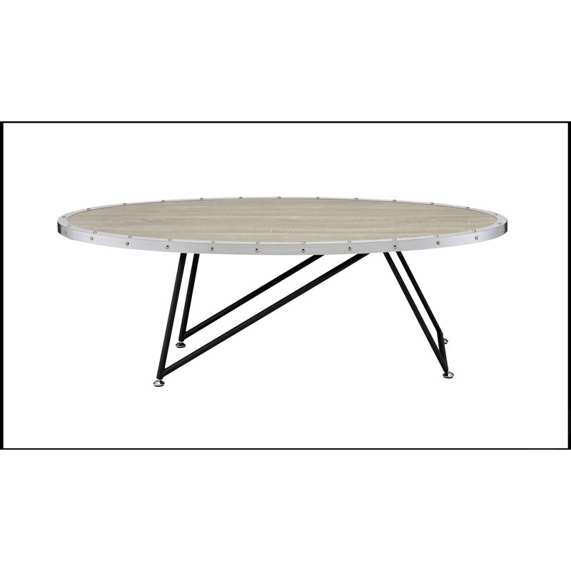 Table basse en chêne vieilli et en métal, idéale pour ajouter une touche rustique et une élégance moderne à votre salon.