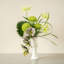 Fleurs artificielles avec vase-344530499