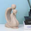 Sculpture moderne moderne avec petit couple-506615784
