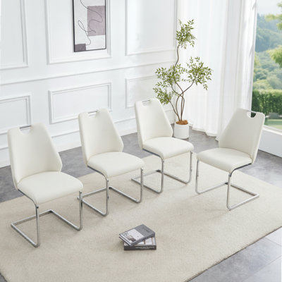 Ensemble de 4 chaises de salle à manger en similicuir avec anneau argenté et poignée chromée, dossier haut rembourré