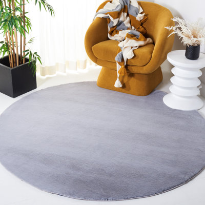 Chinda Faux Rabbit Fur Performance Machine Washable Solid Color Rug