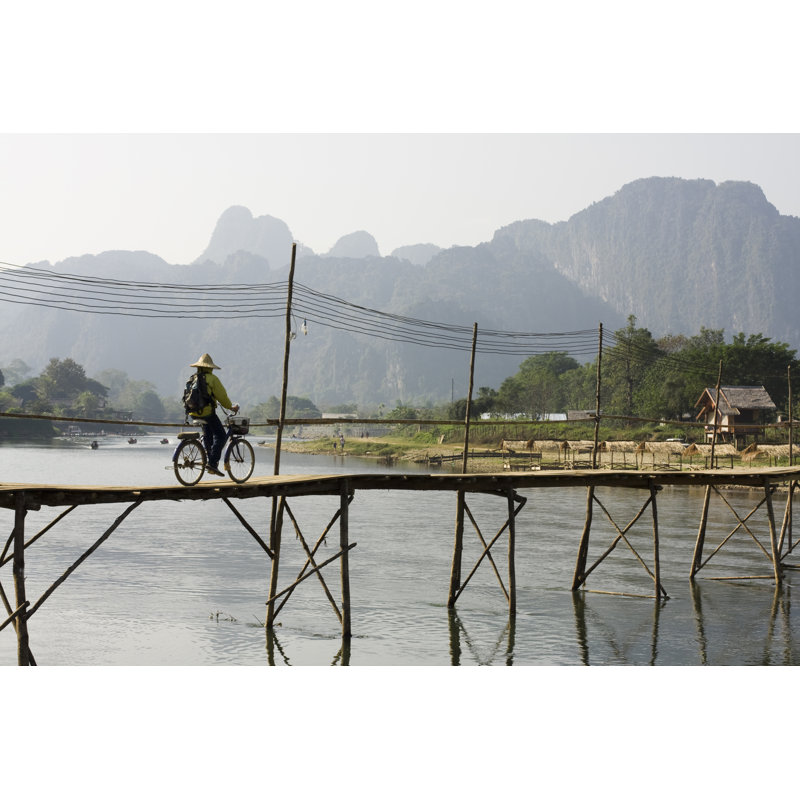 Cycling In Laos by MadeByMaja - Wrapped Canvas Print, 51cm H x 76cm W