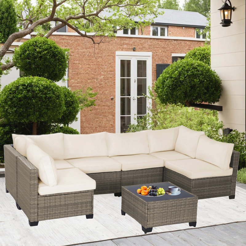 All-Weather 7-Piece Grey PE Wicker Patio Conversation Set with Beige Cushions and coffee table