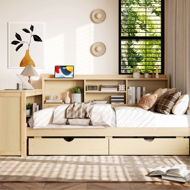Lit de jour simple avec tiroirs de rangement, station de charge et bibliothèque pour une chambre relaxante