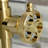 Kingston Brass Webb Two-Handle 2-Hole Deck Mount Bridge Bathroom Faucet with Knurled Handle and Push Pop-Up Drain-62151585