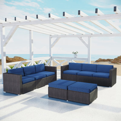Canapé modulaire d'extérieur en osier avec coussins Deeana