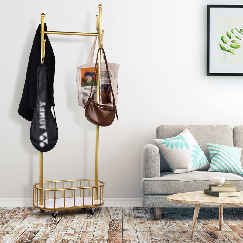 Portant à vêtements 32 po en métal doré avec roues verrouillables et panier de rangement inférieur, idéal pour un usage domestique et commercial dans le couloir, la chambre à coucher, le salon, le balcon, le bureau