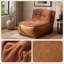 Élégant fauteuil à une place avec dossier sculptural et table d'appoint intégrée pour un confort et un style de salon améliorés