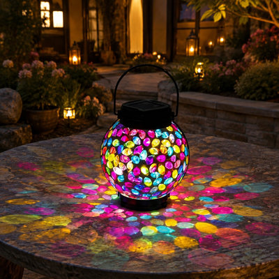 Waterproof mosaic solar lights use an outdoor hanging-lantern design for patios, yards, gardens, or porches and can be given as birthday gifts to women, Mom, or Grandma.