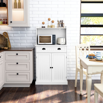 Nazyia 54" Freestanding Kitchen Pantry Storage Cabinet with Doors and Adjustable Shelves, Microwave Oven Stand with Drawer for Kitchen by Winston Porter