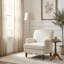 Fauteuil moderne rembourré avec pieds tournés-951753808