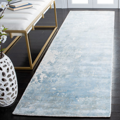 Tapis turquoise / blanc / gris noué à la main Ely