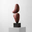 Brun rougeâtre + objet décoratif en bois massif noir