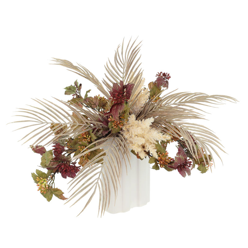 Centre de table en mélange de fleurs dans un vase en céramique