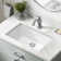 KRAUS Elavo. Rectangular Porcelain Ceramic Undermount Bathroom Sink In White With Overflow Drain, KCU-242