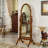 62.99"Special-shaped glass mirror with brown rubberwood frame and hanging mirror for dressing up