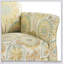 Chaise d'appoint confortable et élégante avec des matériaux de haute qualité, parfaite pour les salons modernes et la détente douillette.