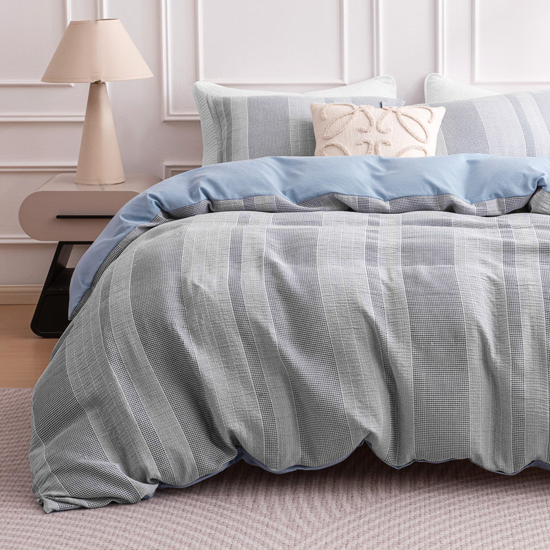 Ensemble de housse de couette verticale gaufrée, ensemble de literie douillette en jacquard à rayures de qualité supérieure, résistant à la décoloration.