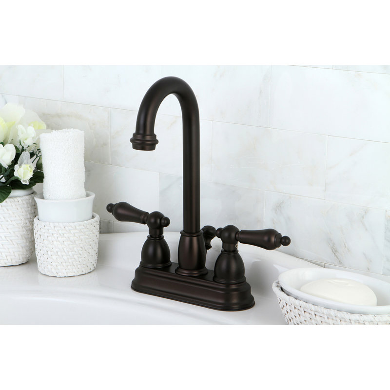 Kingston Brass Restoration Two-Handle 3-Hole Deck Mount 4" Centerset Bathroom Faucet with Plastic Pop-Up, Oil Rubbed Bronze
