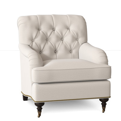 Fauteuil à coussin en duvet capitonné Devan