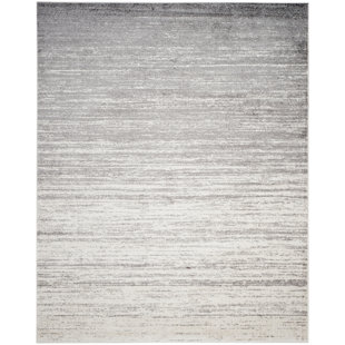 https://assets.wfcdn.com/im/33179614/resize-h310-w310%5Ecompr-r85/2404/240427396/gicu-ivory-silver-area-rug.jpg