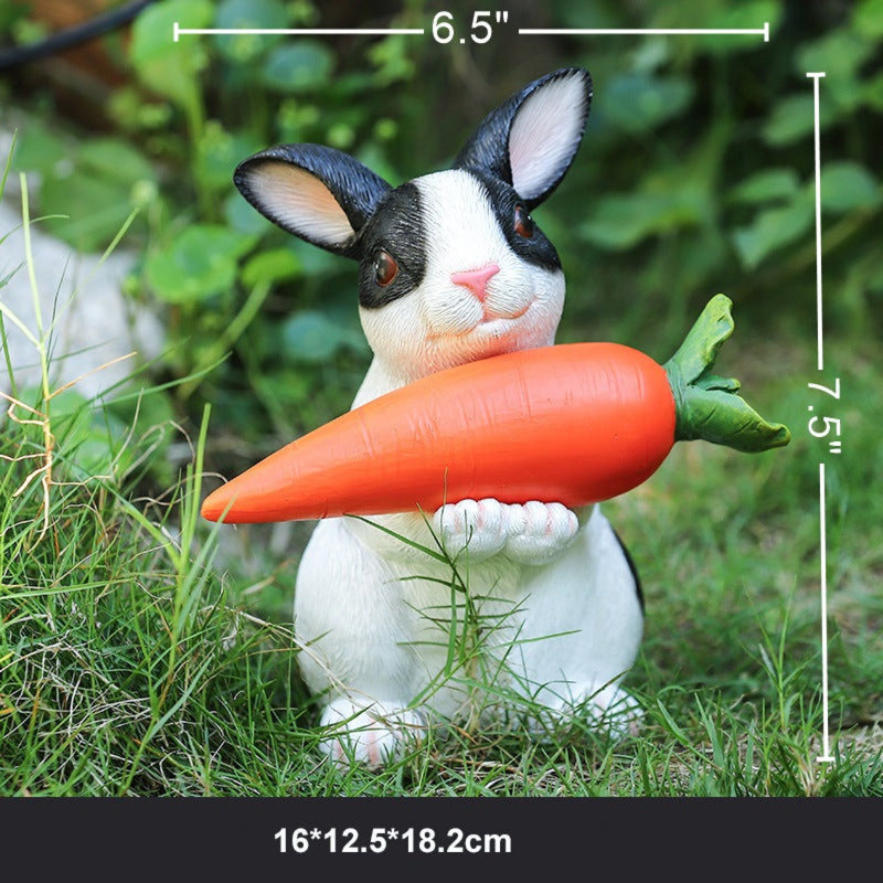 Statue de lapin Marieme à énergie solaire avec une carotte