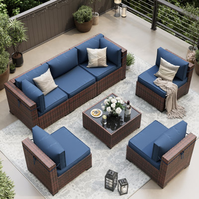 7 Piece Rattan Sectional Seating Group With Cushions
