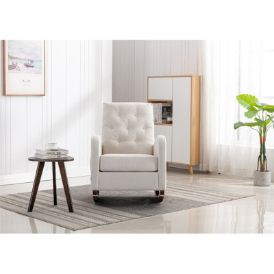 Fauteuil berçant à haut dossier