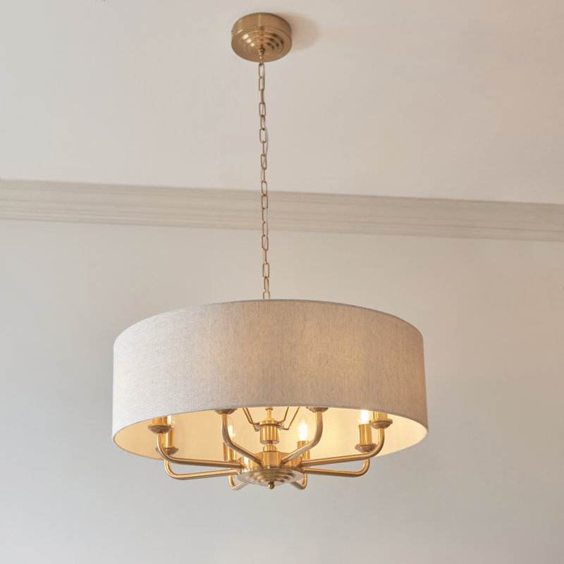 Azmoe 8-Light Chandelier finished in Vintage Brass and Natural