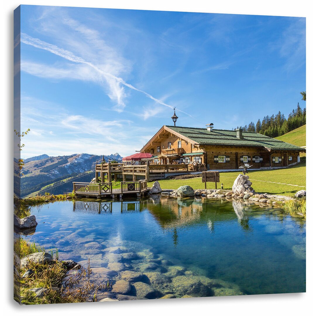 Leinwandbild Schönes Haus in den Alpen